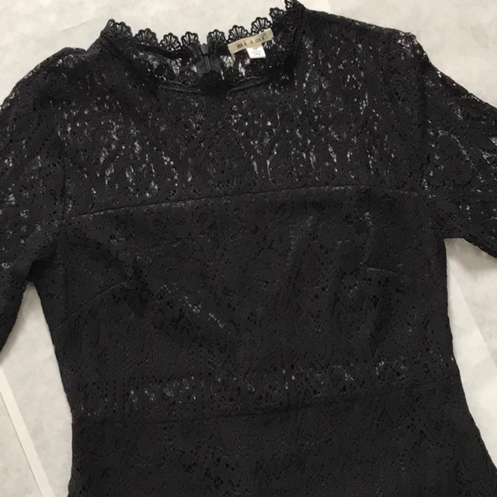 All over black lace dress with sheer neckline and waist elegant party frock